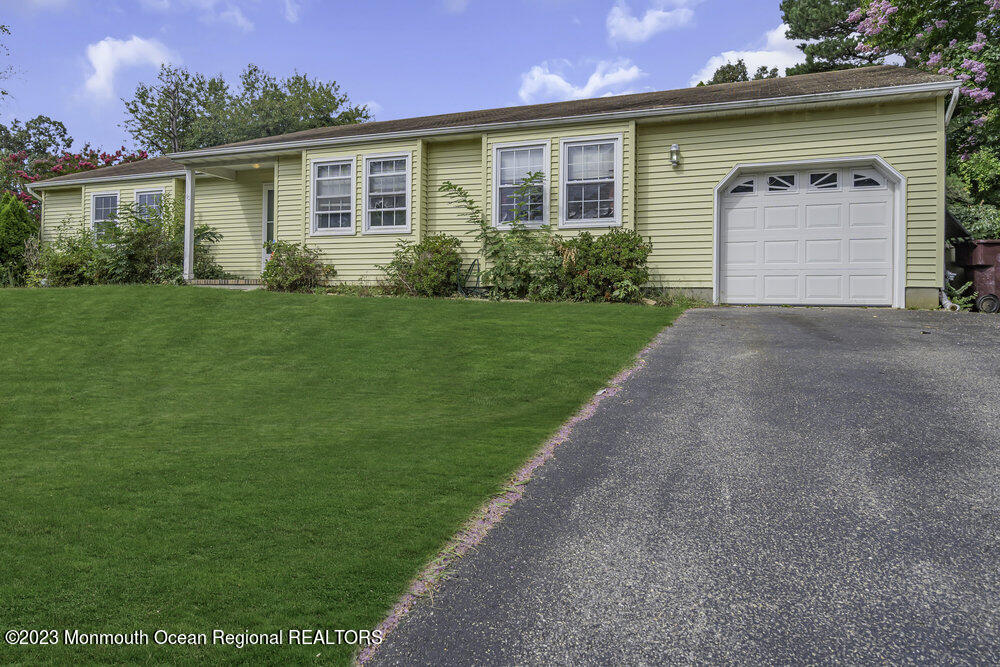 10 Eagle Drive Bayville, NJ 08721 - Photo 2 of 42 a front view of house with yard and green space