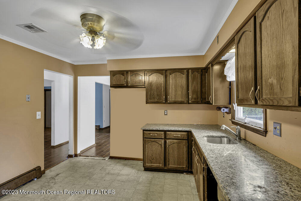 10 Eagle Drive Bayville, NJ 08721 - Photo 26 of 42 a kitchen with a sink appliances and cabinets
