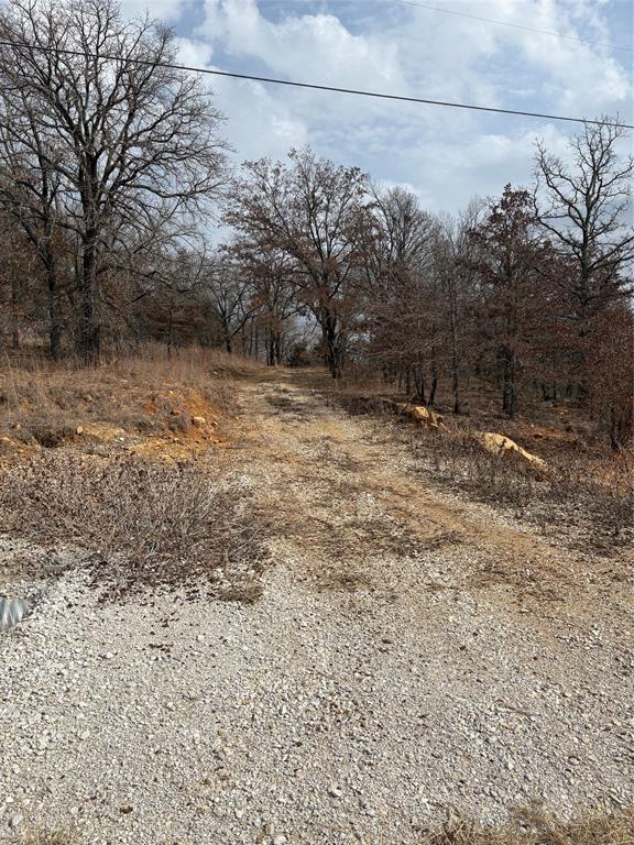 454 Ranchview Court Bowie, TX 76230 - Photo 2 of 9 Driveway to pad site