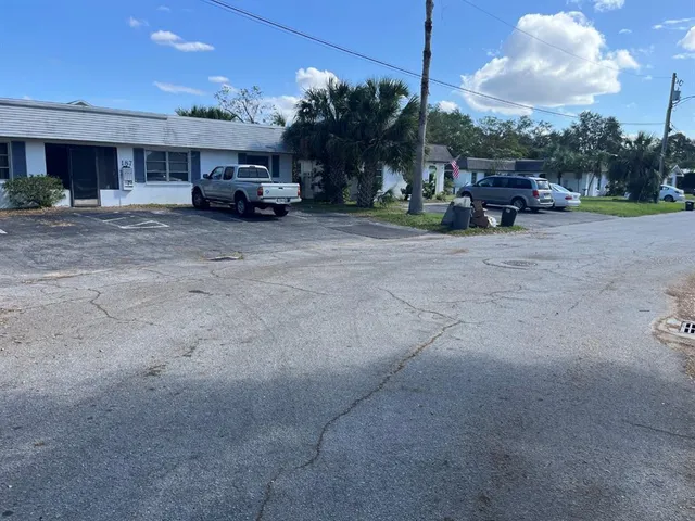 a car parked in front of a building