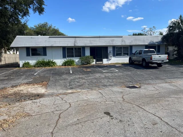 a view of a car parked in front of house