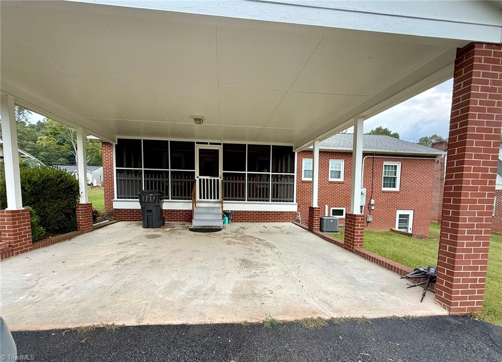 435 Elk Spur Street Elkin, NC 28621 - Photo 7 of 44 Double carport & Screened porch