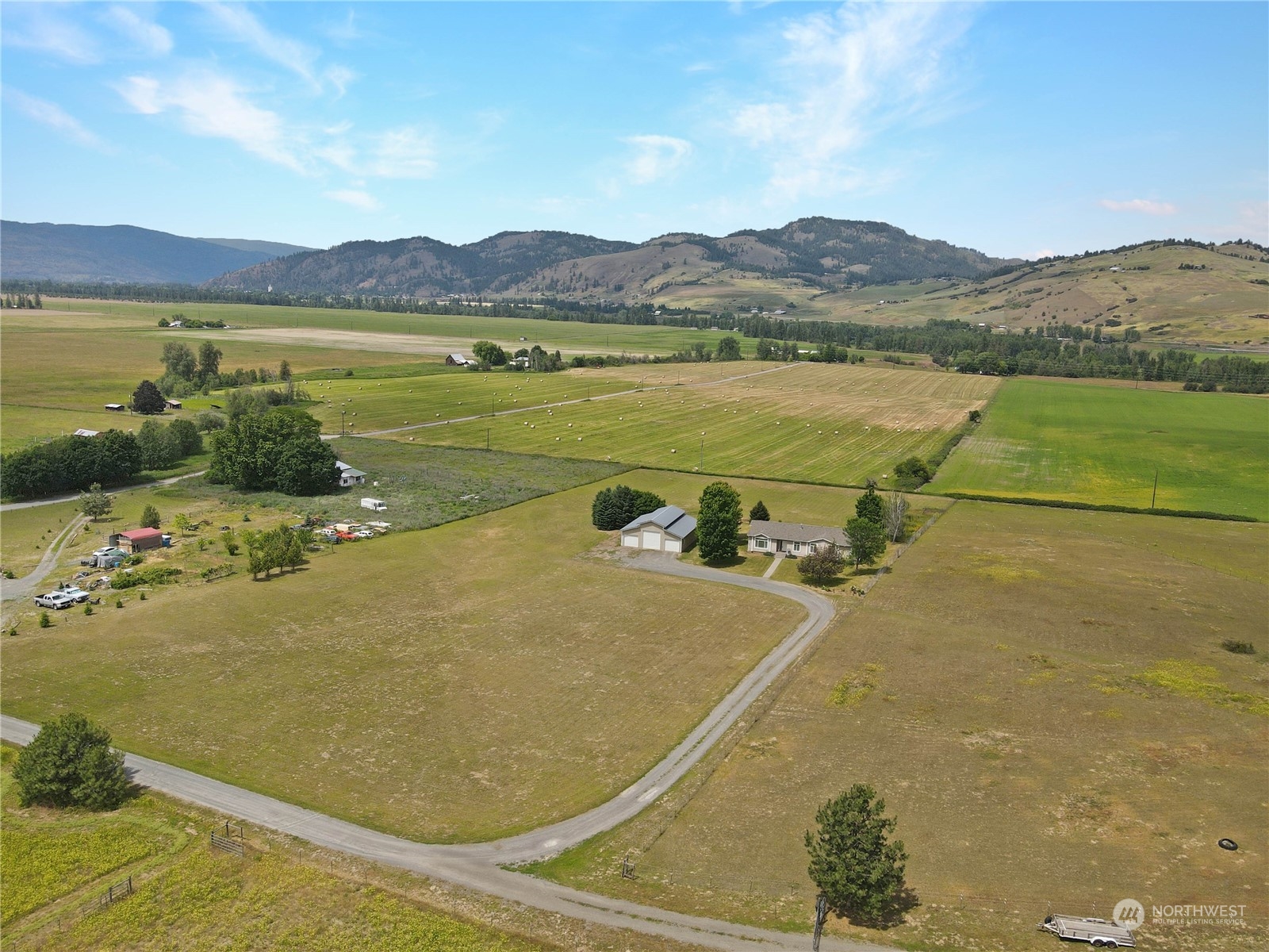 708 V Hoffman Road Kettle Falls, WA 99141 - Photo 5 of 40 a view of a lake with a mountain