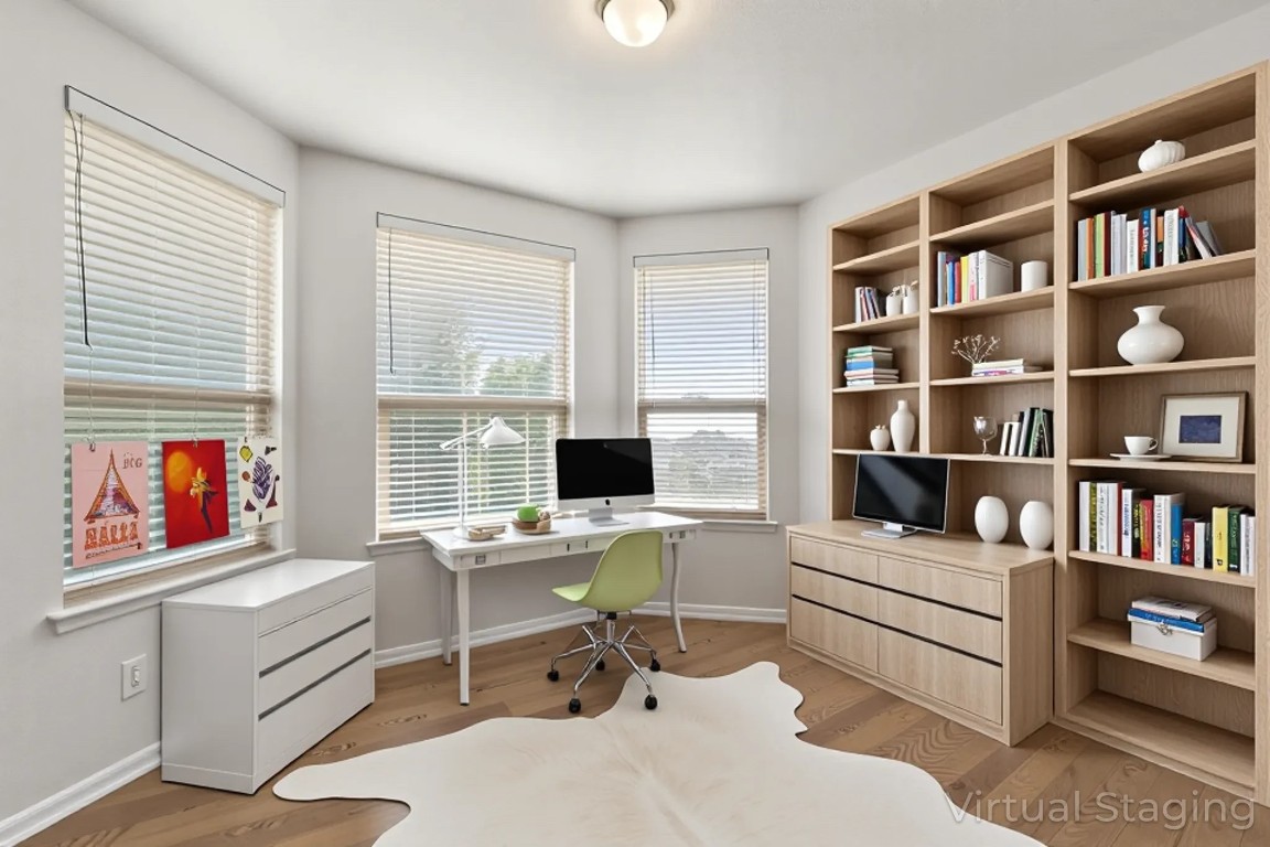 9617 Solana Vista Loop, Unit A Austin, TX 78750 - Photo 26 of 35 a view of a workspace with a bookshelf