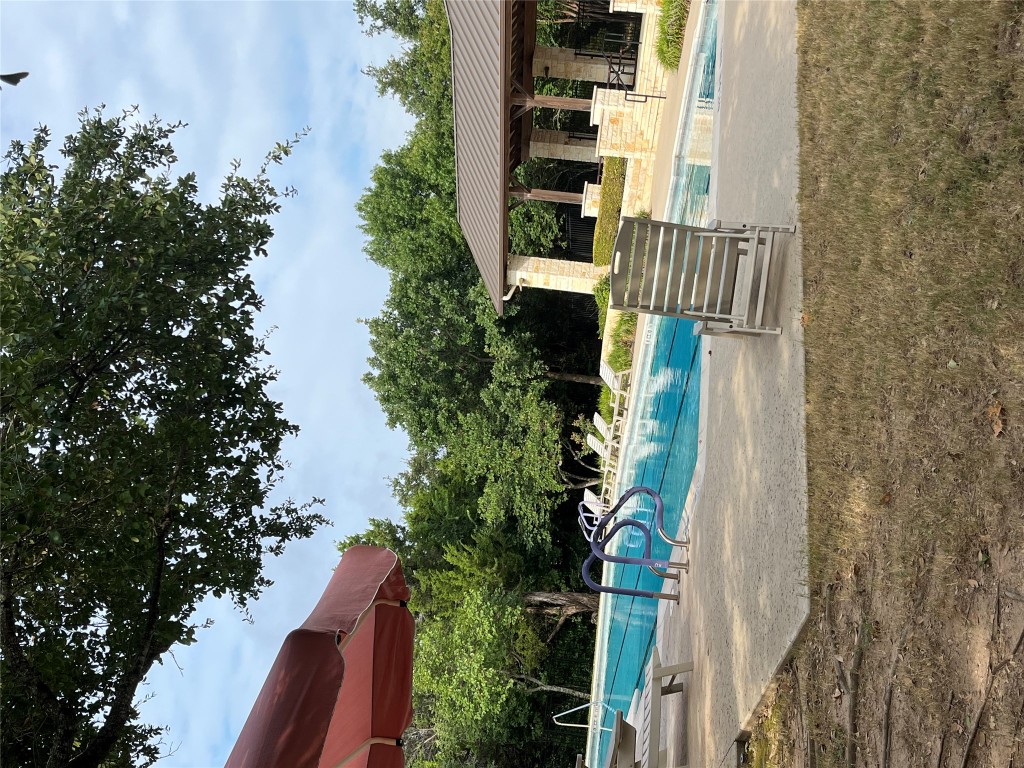9617 Solana Vista Loop, Unit A Austin, TX 78750 - Photo 34 of 35 a view of a house with a yard