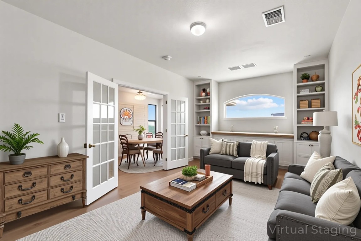 9617 Solana Vista Loop, Unit A Austin, TX 78750 - Photo 7 of 35 a living room with furniture and a large window