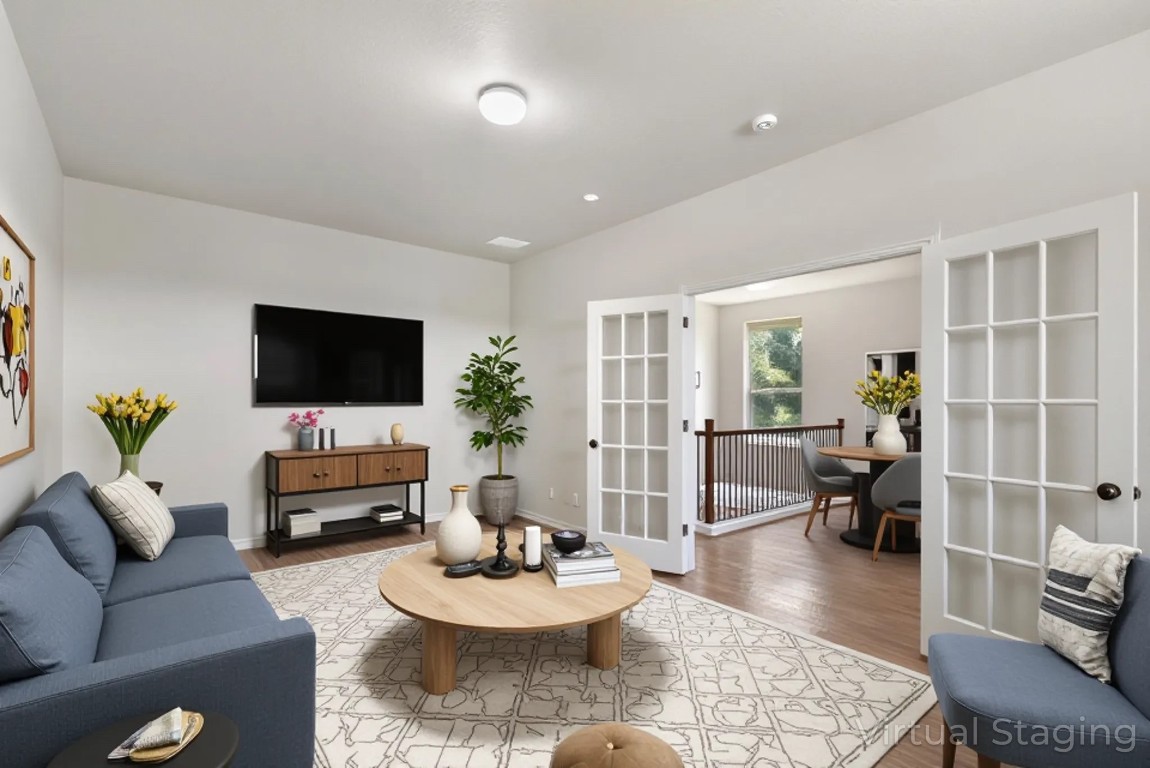 9617 Solana Vista Loop, Unit A Austin, TX 78750 - Photo 8 of 35 a living room with furniture and a flat screen tv