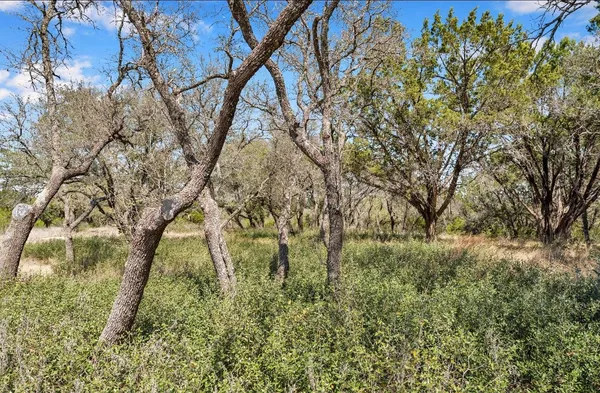 a patio with a table and chairs