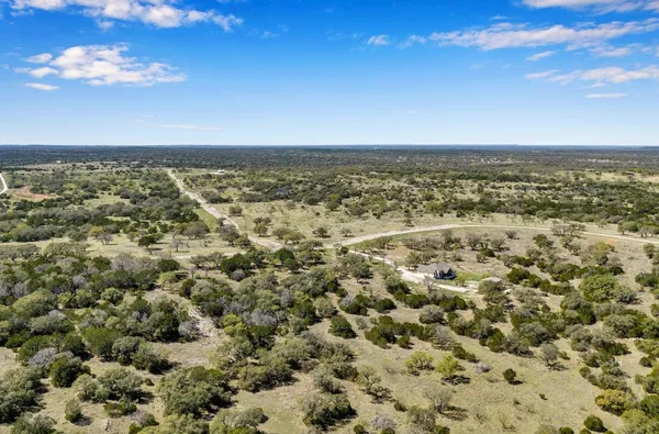 a view of a city with an ocean