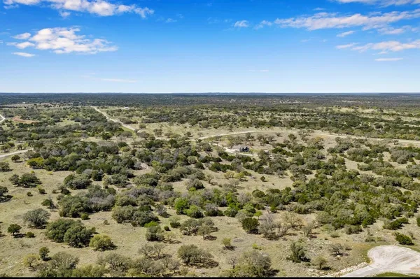 a view of a city with an ocean view