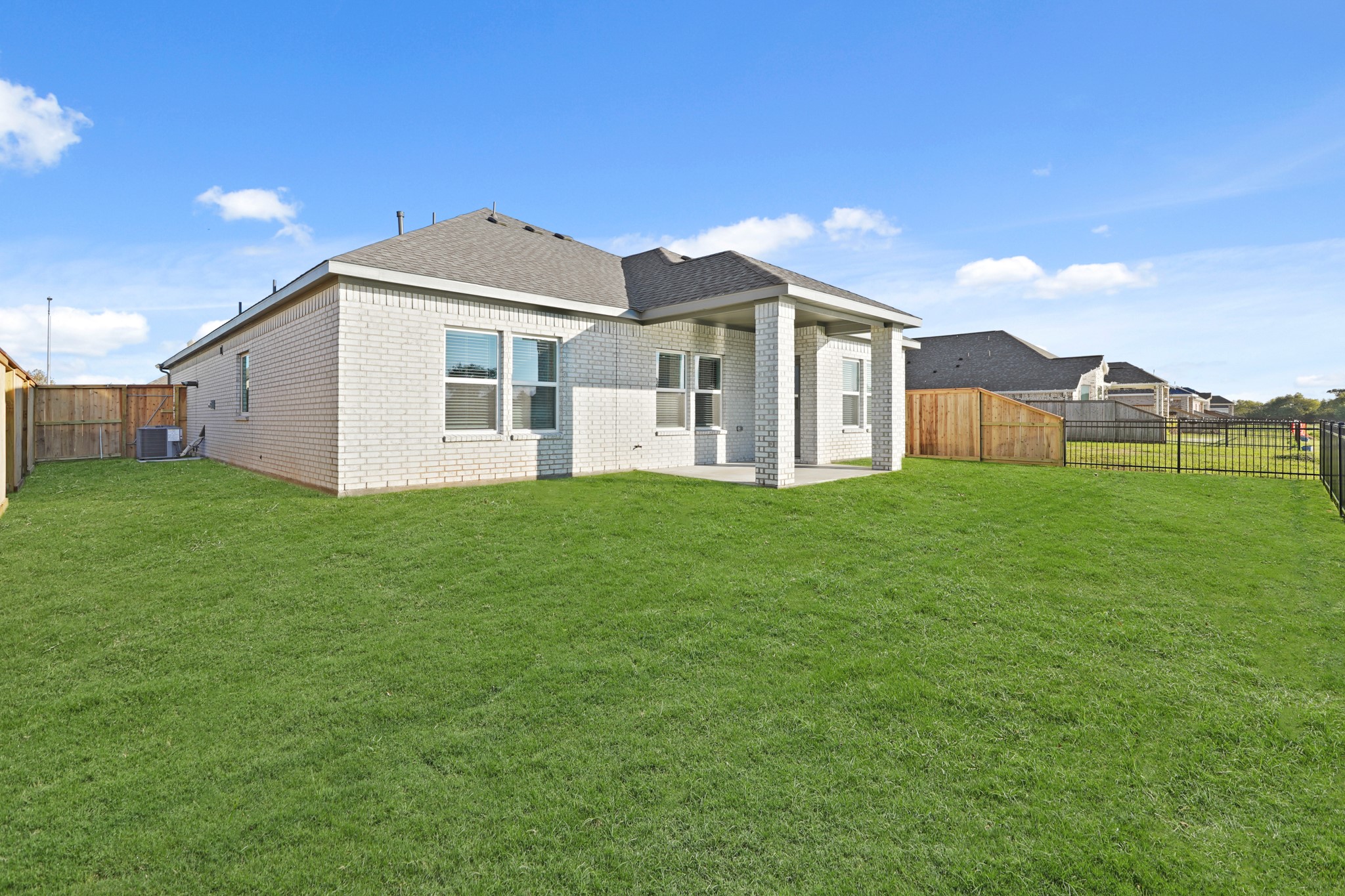112 Water Grass Trail Clute, TX 77531 - Photo 23 of 36 a front view of a house with a yard