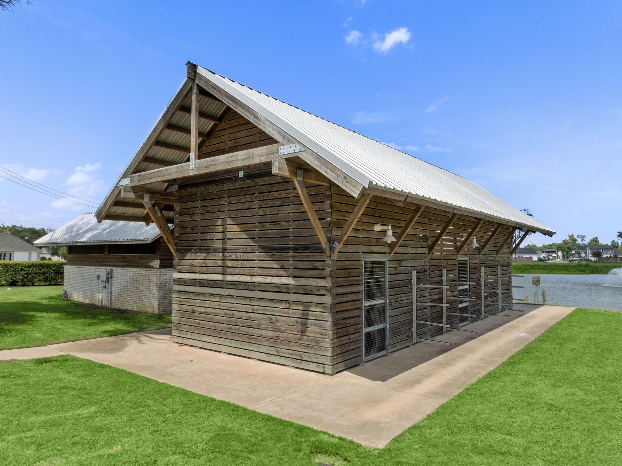 112 Water Grass Trail Clute, TX 77531 - Photo 30 of 36 a view of house with garden