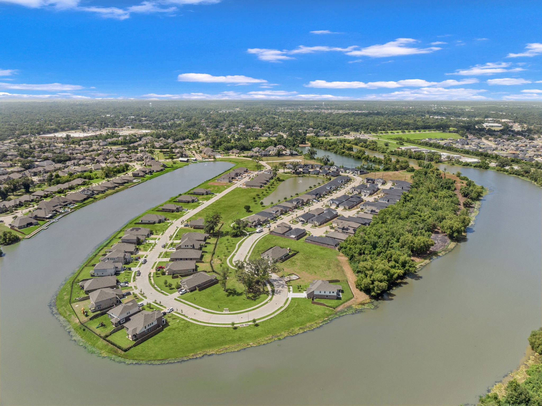 112 Water Grass Trail Clute, TX 77531 - Photo 35 of 36 a view of a swimming pool with a chair