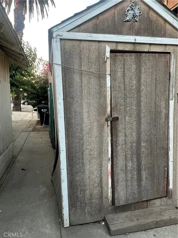 a view of a door and a window