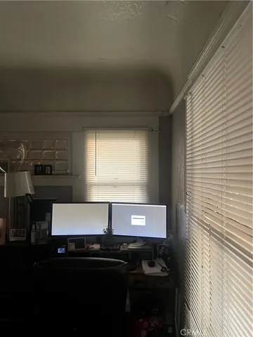 a kitchen with a sink and a microwave