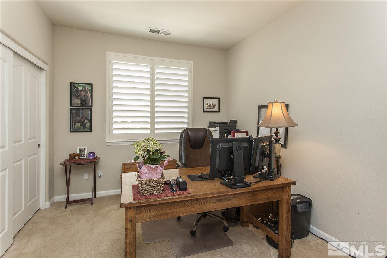 470 Sysonby Court Reno, NV 89521 - Photo 21 of 36 a view of a workspace with furniture and a window