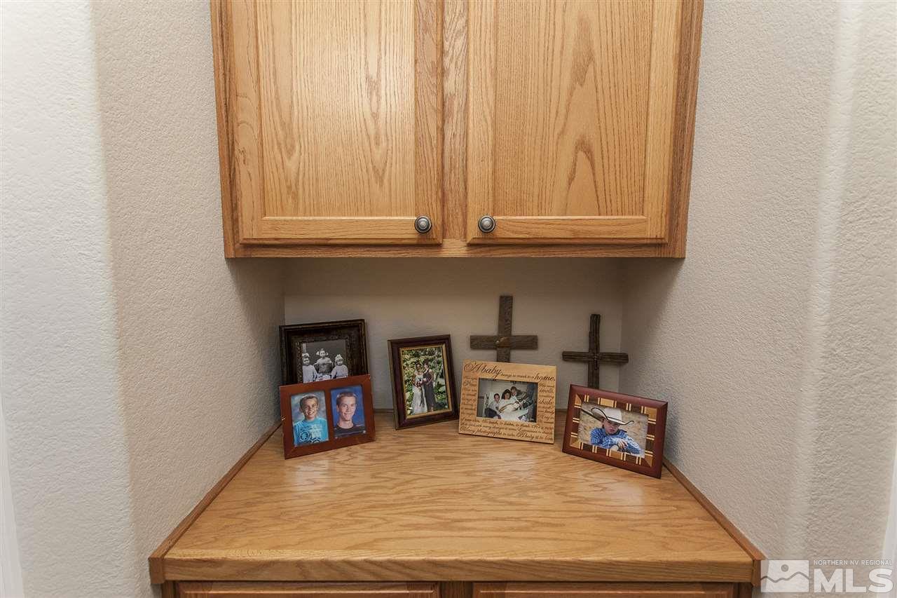 470 Sysonby Court Reno, NV 89521 - Photo 24 of 36 a room with furniture and a fireplace