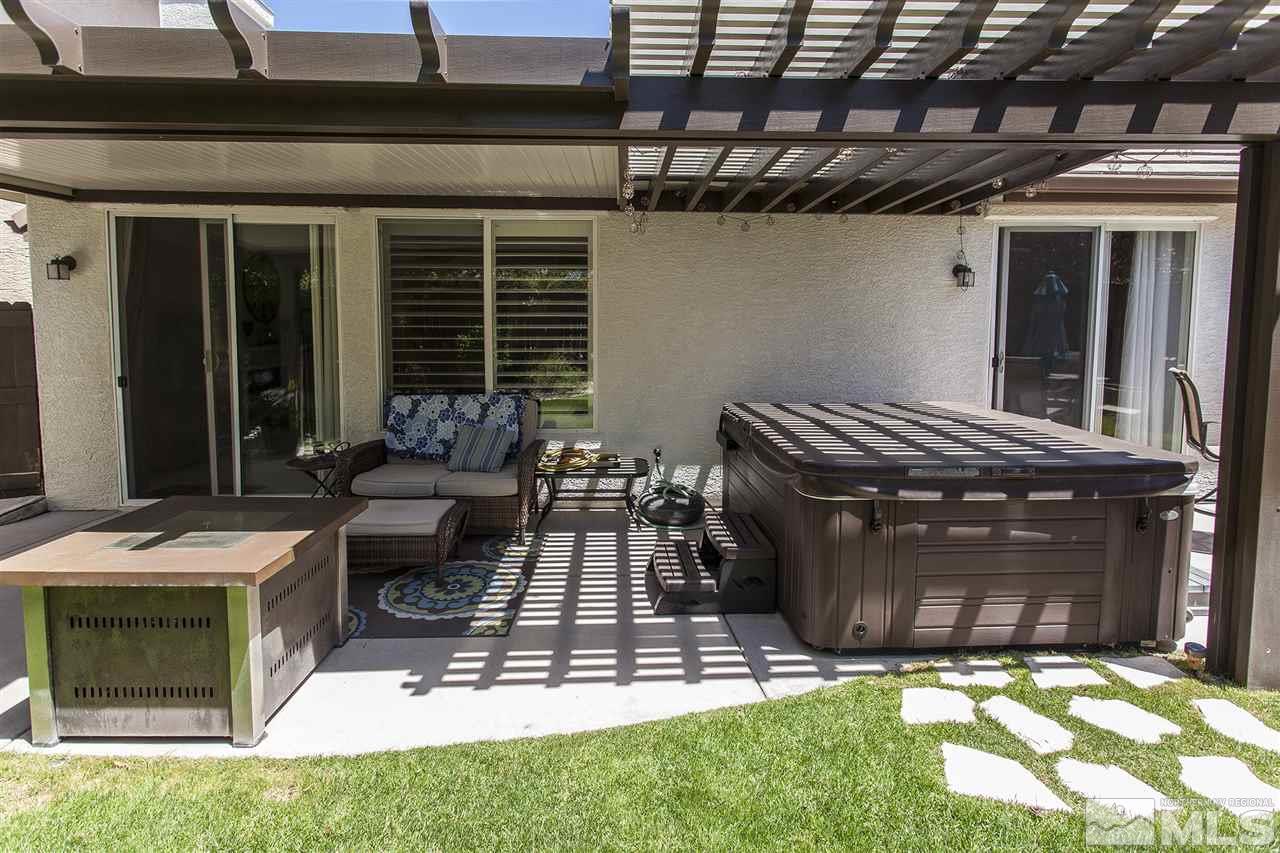 470 Sysonby Court Reno, NV 89521 - Photo 30 of 36 a outdoor living space with furniture and a fireplace