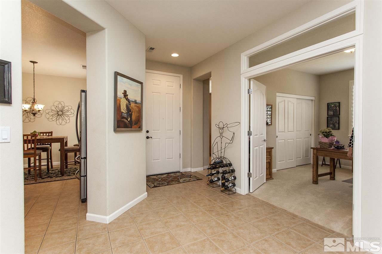 470 Sysonby Court Reno, NV 89521 - Photo 3 of 36 a view of a hallway with furniture and a livingroom