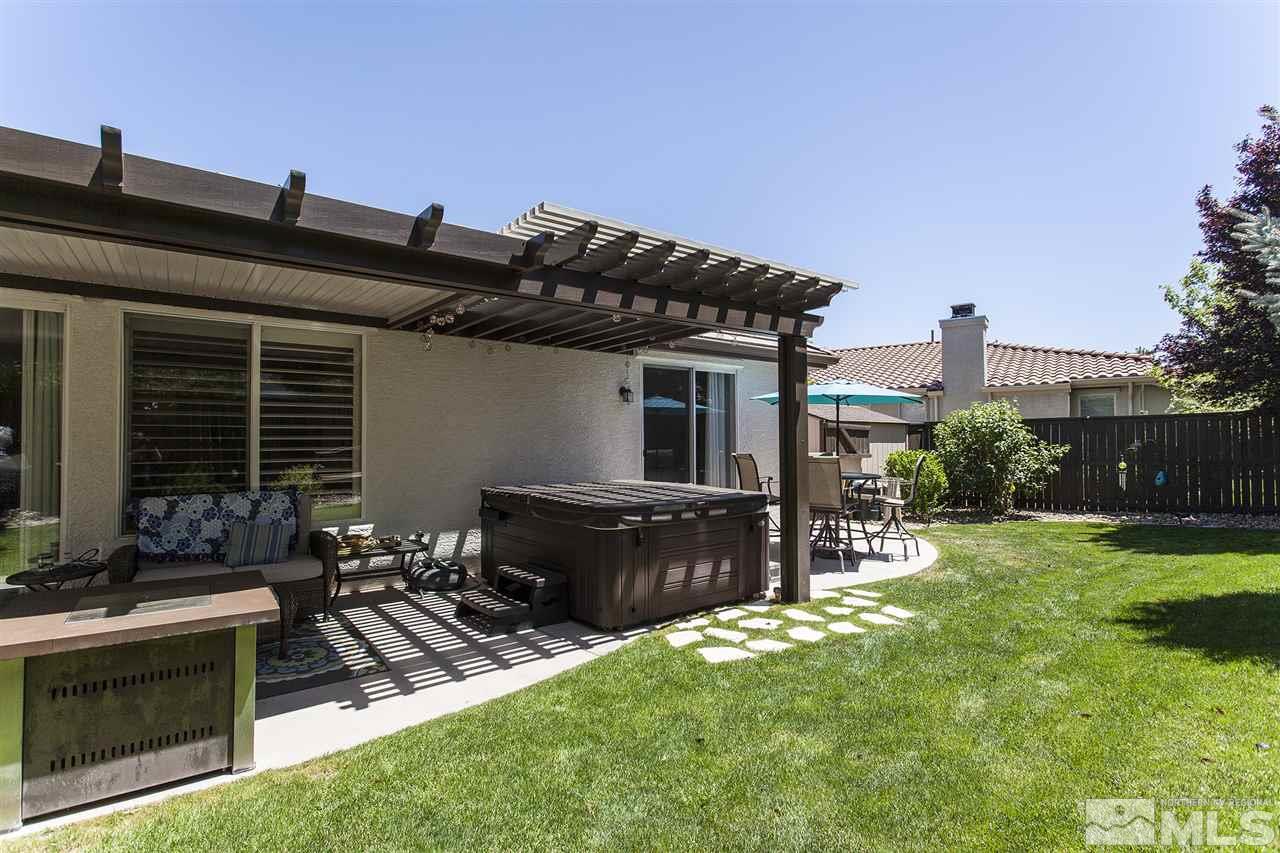 470 Sysonby Court Reno, NV 89521 - Photo 31 of 36 a view of house with backyard outdoor seating and green space