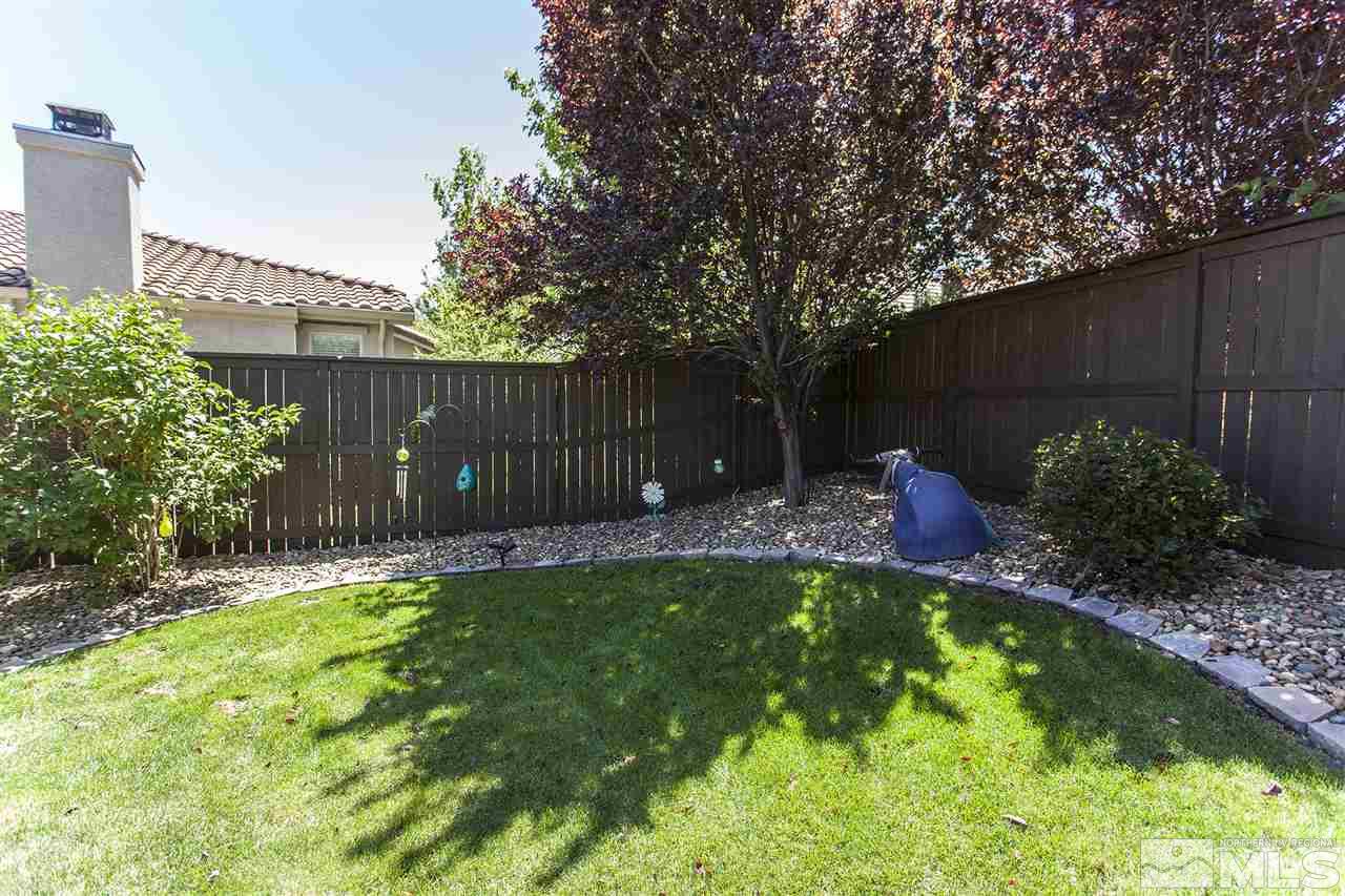 470 Sysonby Court Reno, NV 89521 - Photo 33 of 36 a view of a backyard with a garden