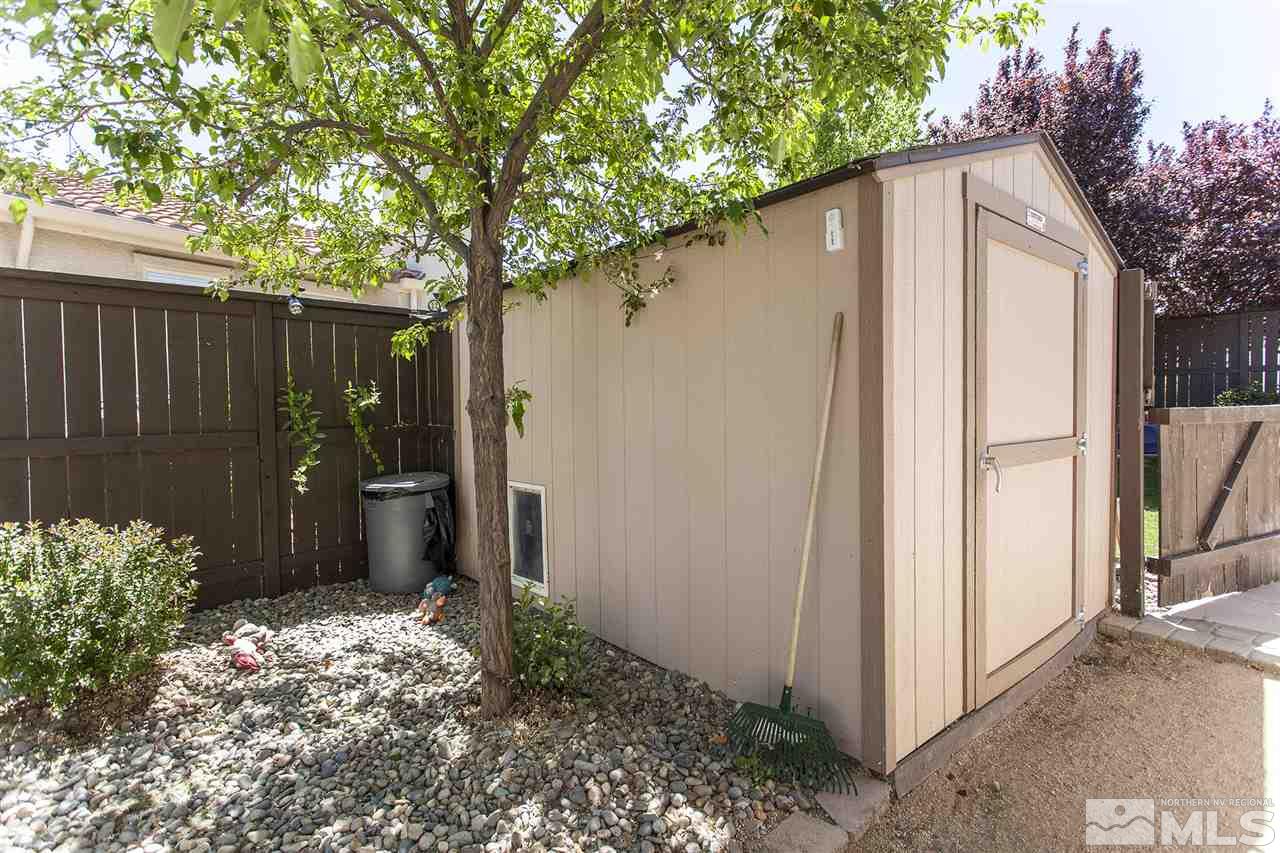 470 Sysonby Court Reno, NV 89521 - Photo 35 of 36 a backyard of a house with lots of green space