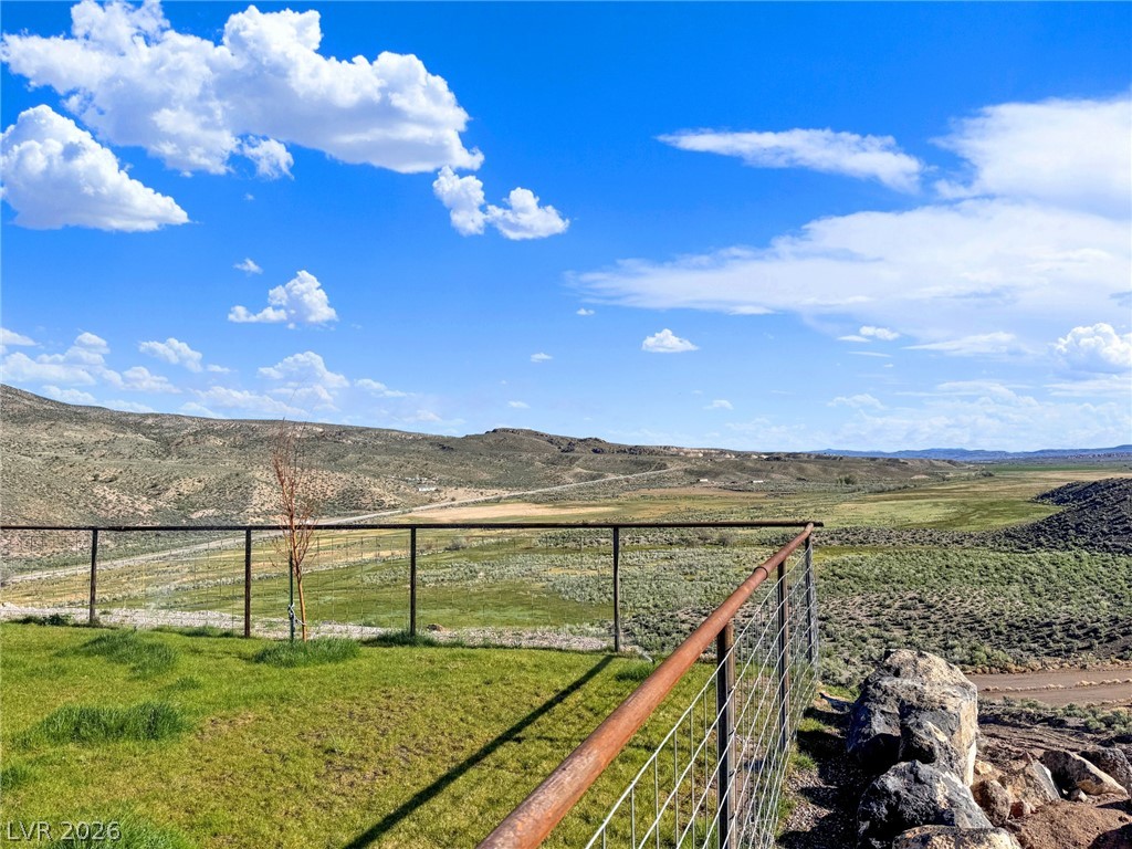 9393 North 93rd Highway Caliente, NV 89008 - Photo 5 of 41 Breathtaking panoramic views of rolling hills and distant valleys await at this serene property.