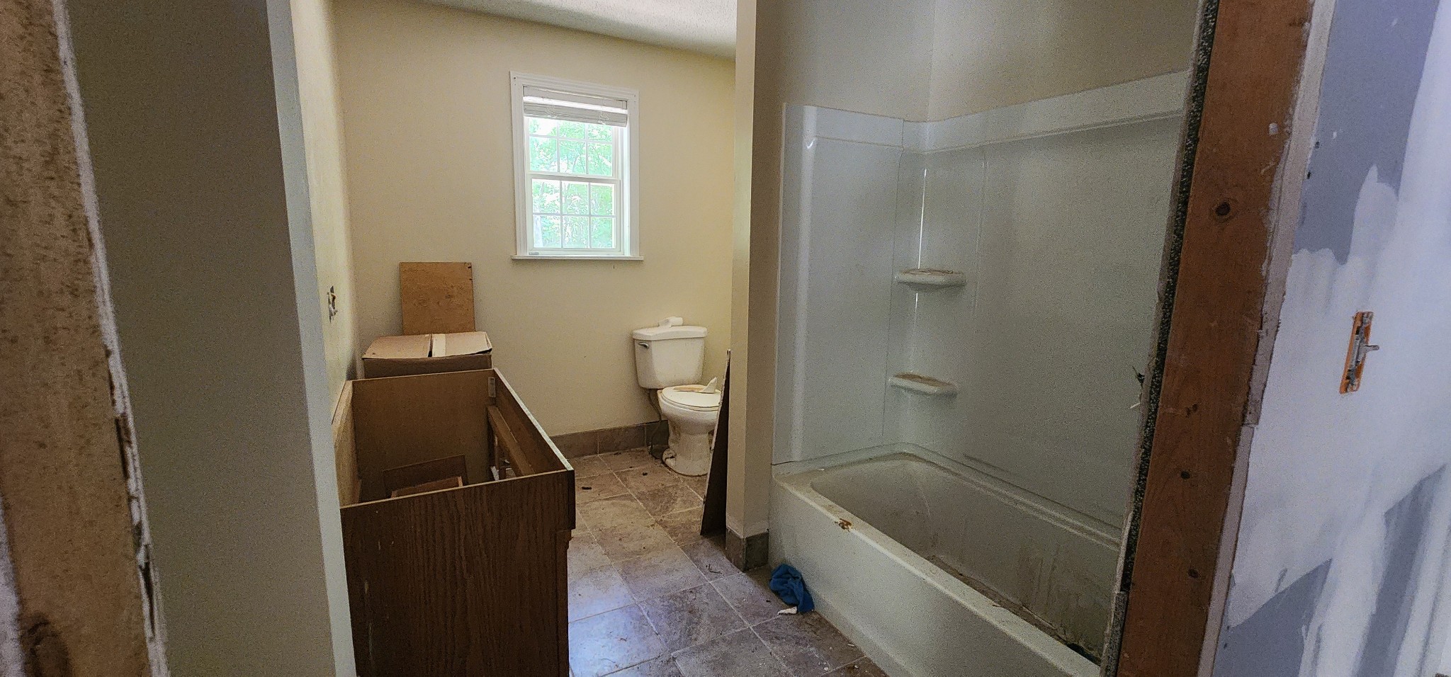 505 Draper Street Paris, TN 38242 - Photo 9 of 11 a bathroom with a tub a sink and a shower