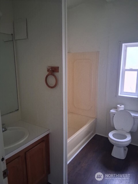 915 Union Mills Road Southeast, Unit 11 Lacey, WA 98503 - Photo 6 of 15 a bathroom with a toilet and a shower