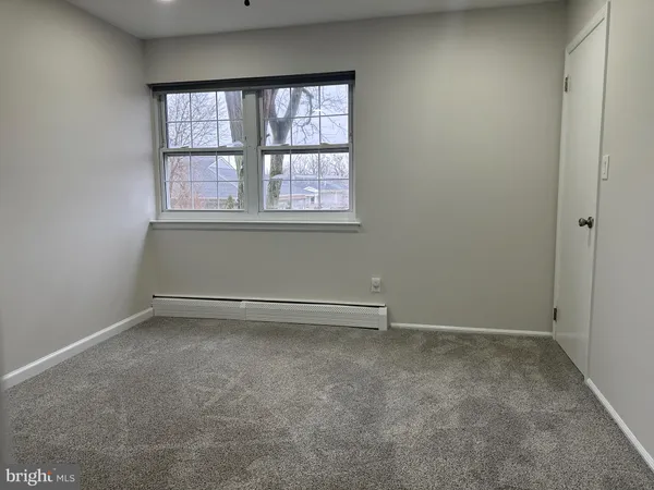 an empty room with a window