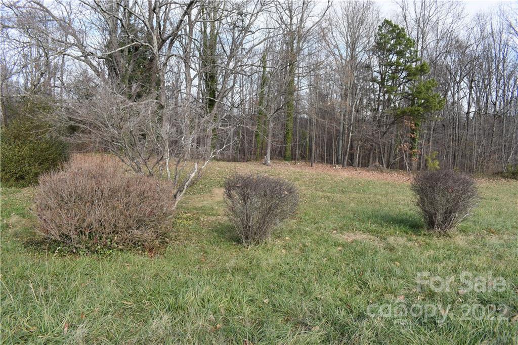 Lot 2 Reeps Grove Church Road Vale, NC 28168 - Photo 1 of 18 a big yard with lots of green space and house in the back