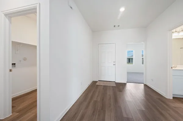 a view of wooden floor in an empty room