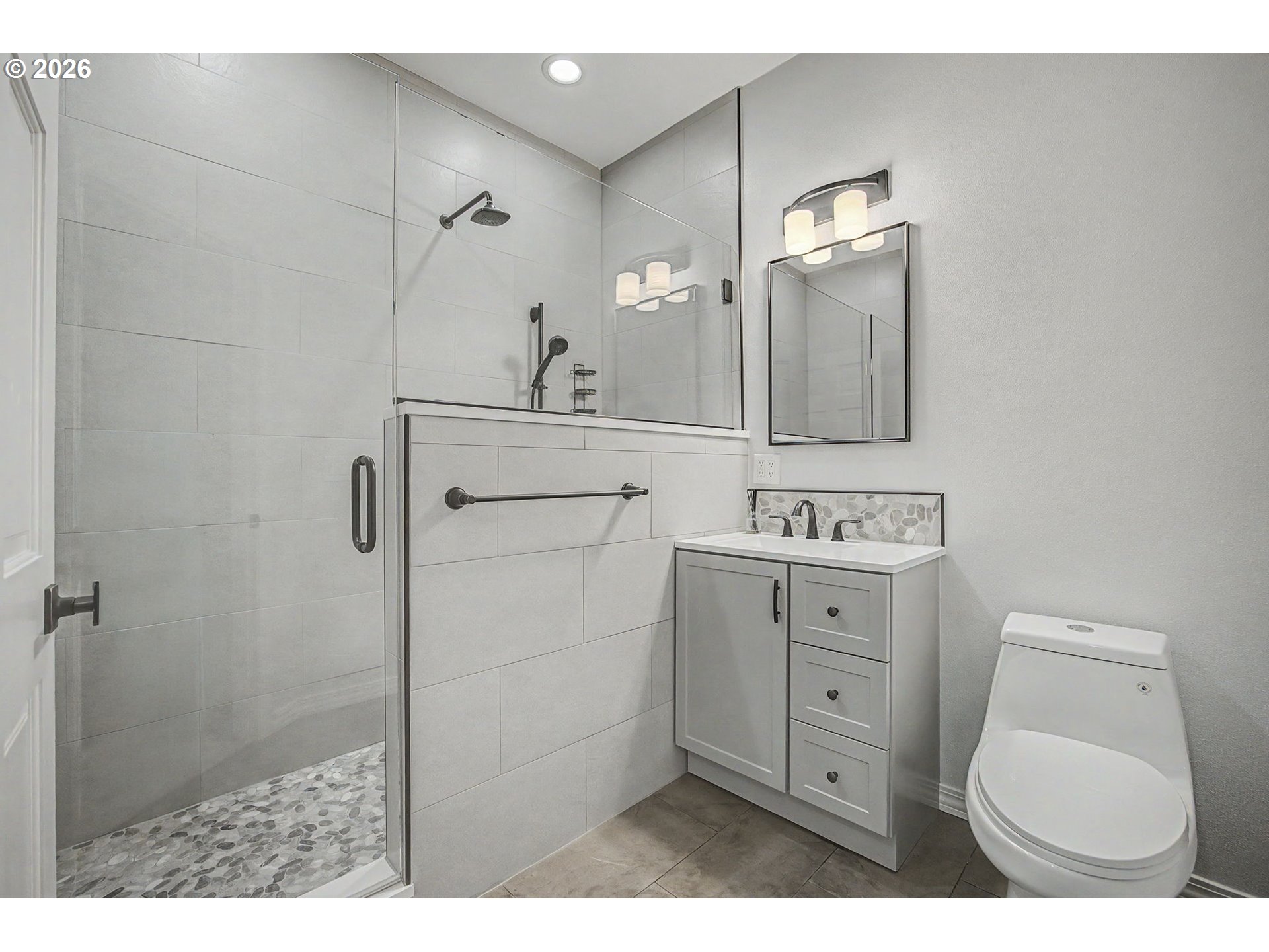 23303 Southeast Howlett Road Eagle Creek, OR 97022 - Photo 35 of 48 a bathroom with a toilet sink and mirror