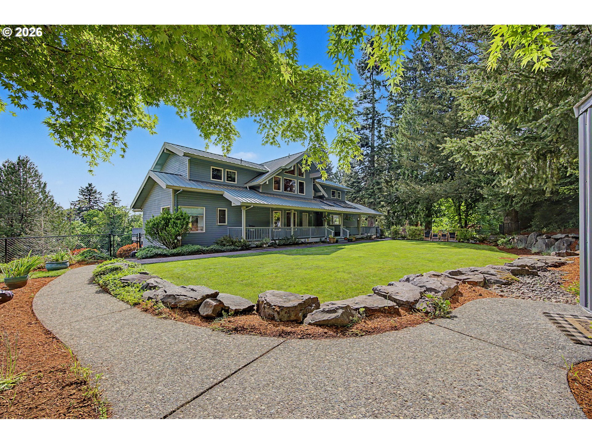 23303 Southeast Howlett Road Eagle Creek, OR 97022 - Photo 4 of 48 a view of an house with swimming pool and yard