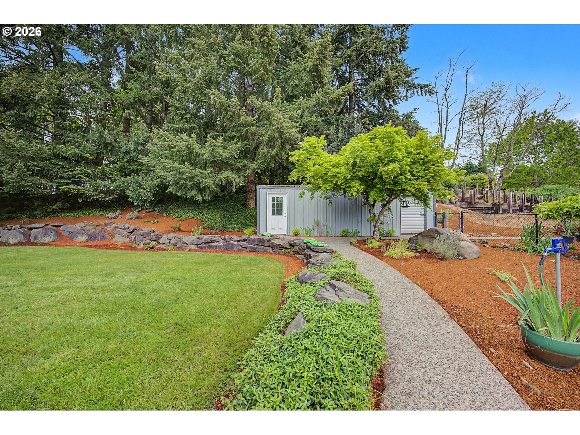 23303 Southeast Howlett Road Eagle Creek, OR 97022 - Photo 41 of 48 a front view of a house with a yard