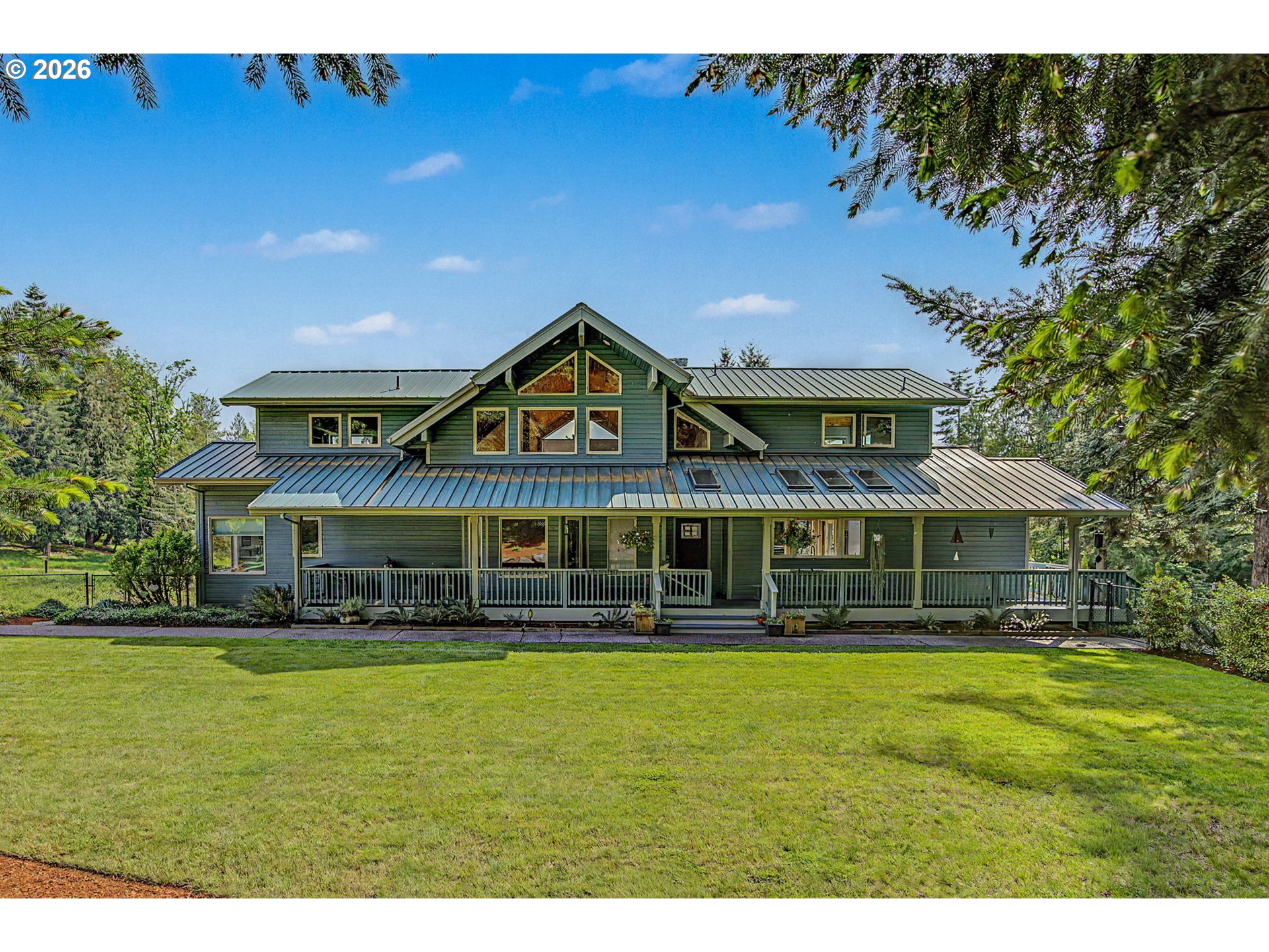 23303 Southeast Howlett Road Eagle Creek, OR 97022 - Photo 5 of 48 a view of a house with a big yard