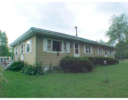 60-ab Swamp Road South Deerfield, MA 01373 - Photo 1 of 1 a front view of a house with a garden