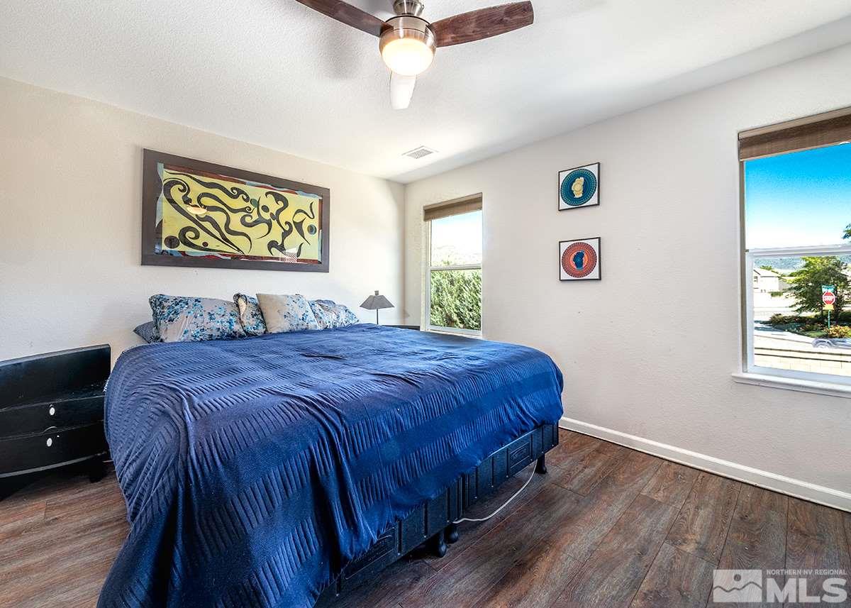 590 Verelli Court Reno, NV 89521 - Photo 17 of 23 a bedroom with a bed and a window