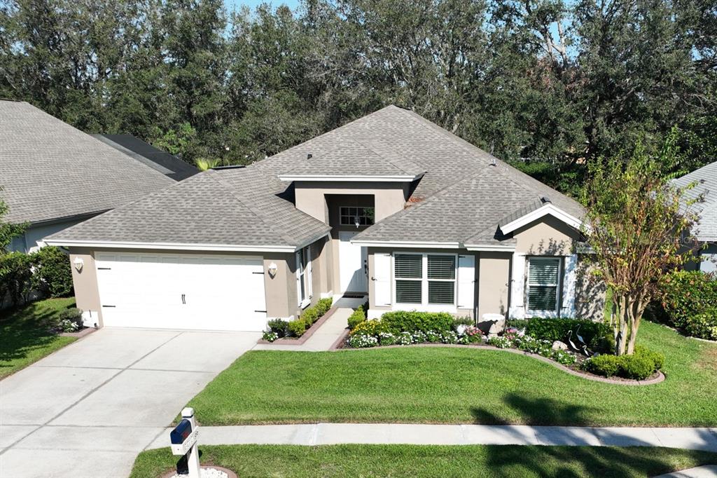 3210 Fox Squirrel Lane Valrico, FL 33596 - Photo 1 of 1 a front view of a house with a yard