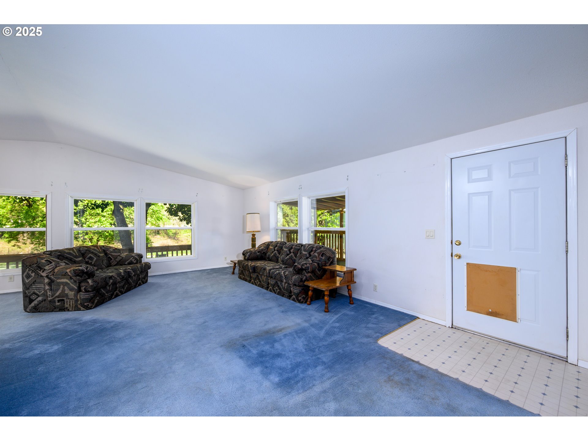 694 Tipton Road Roseburg, OR 97471 - Photo 16 of 36 a living room with furniture and a large window