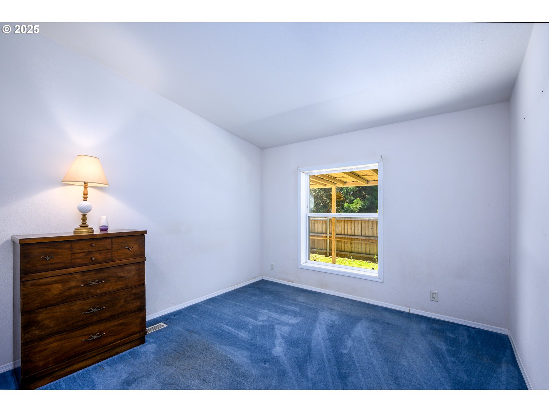 694 Tipton Road Roseburg, OR 97471 - Photo 22 of 36 a view of an empty room with a window