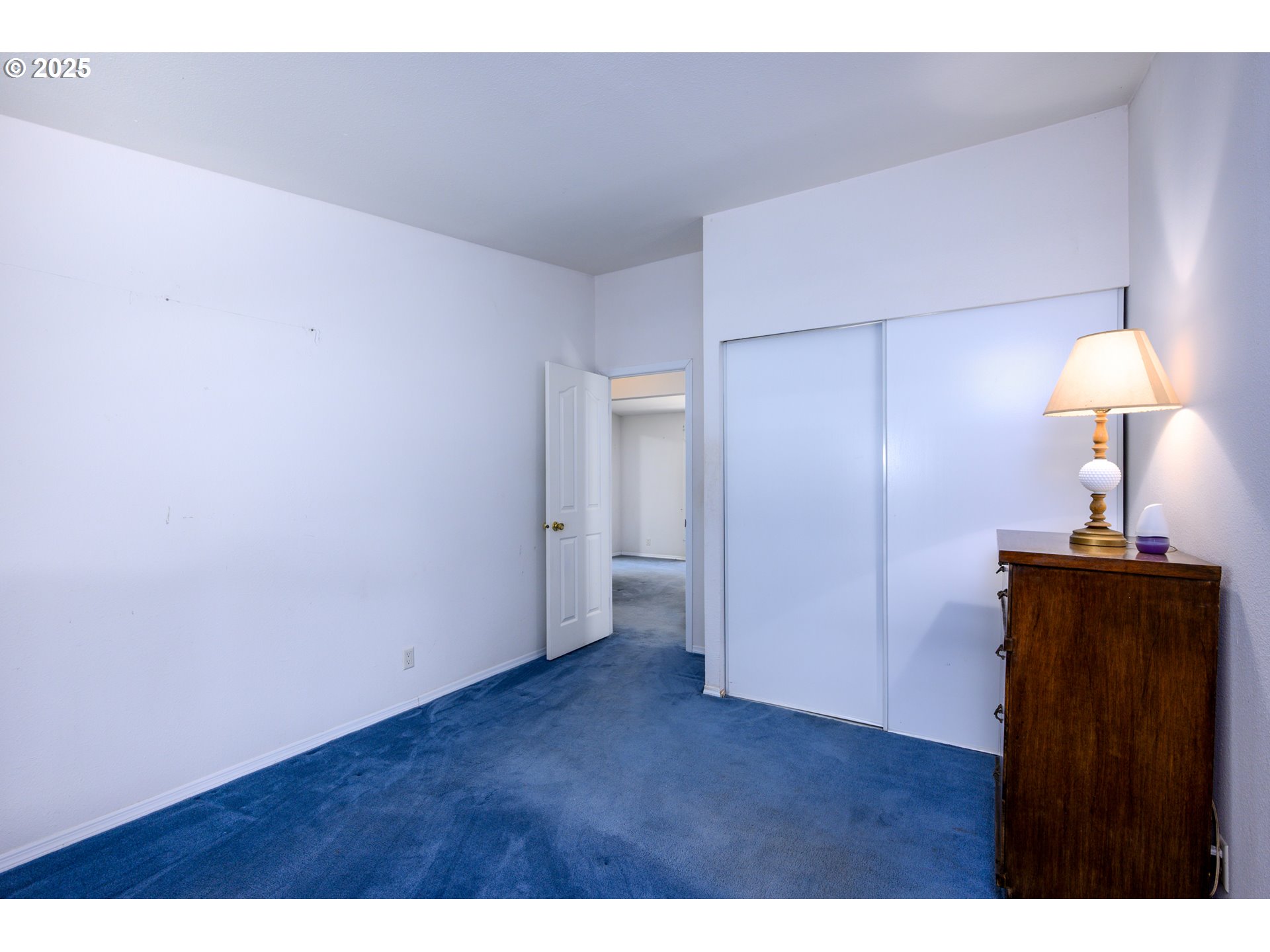 694 Tipton Road Roseburg, OR 97471 - Photo 23 of 36 a view of an empty room and wooden floor