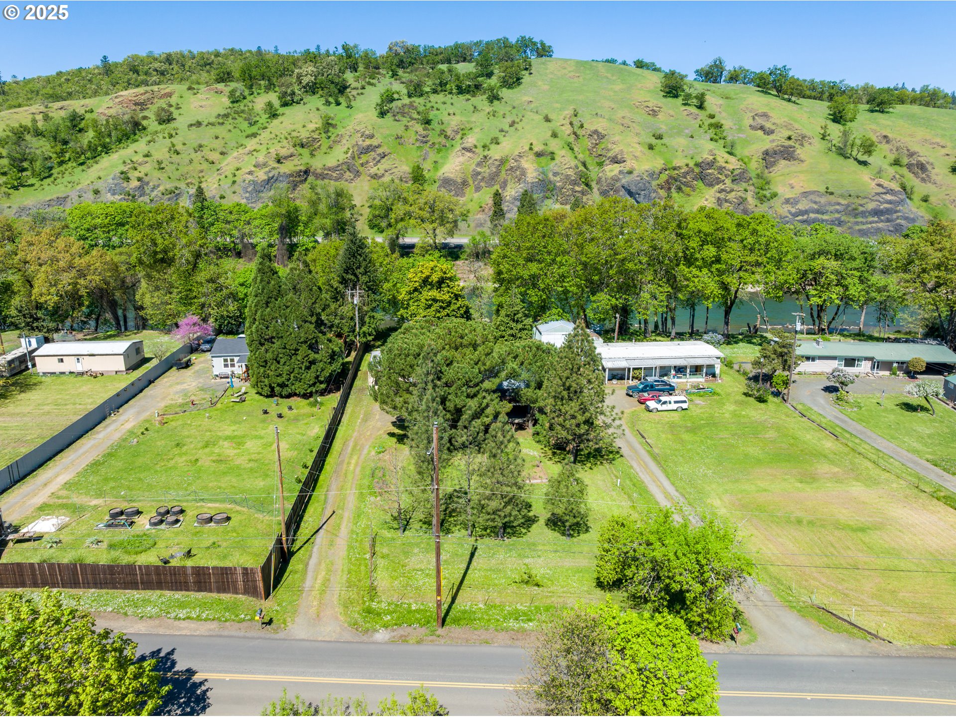 694 Tipton Road Roseburg, OR 97471 - Photo 31 of 36 an aerial view of residential houses with outdoor space and street view