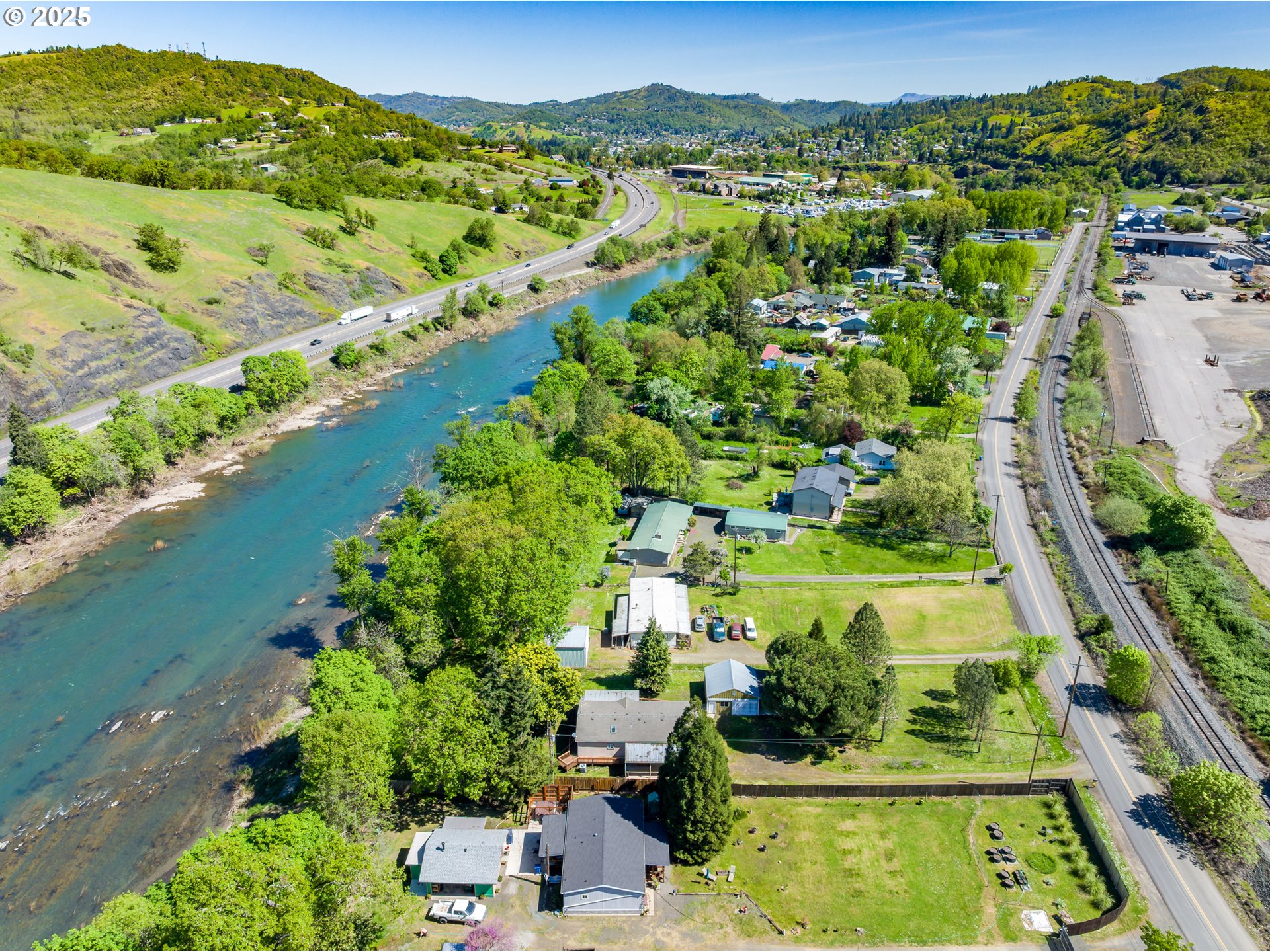 694 Tipton Road Roseburg, OR 97471 - Photo 35 of 36 an aerial view of residential houses with outdoor space