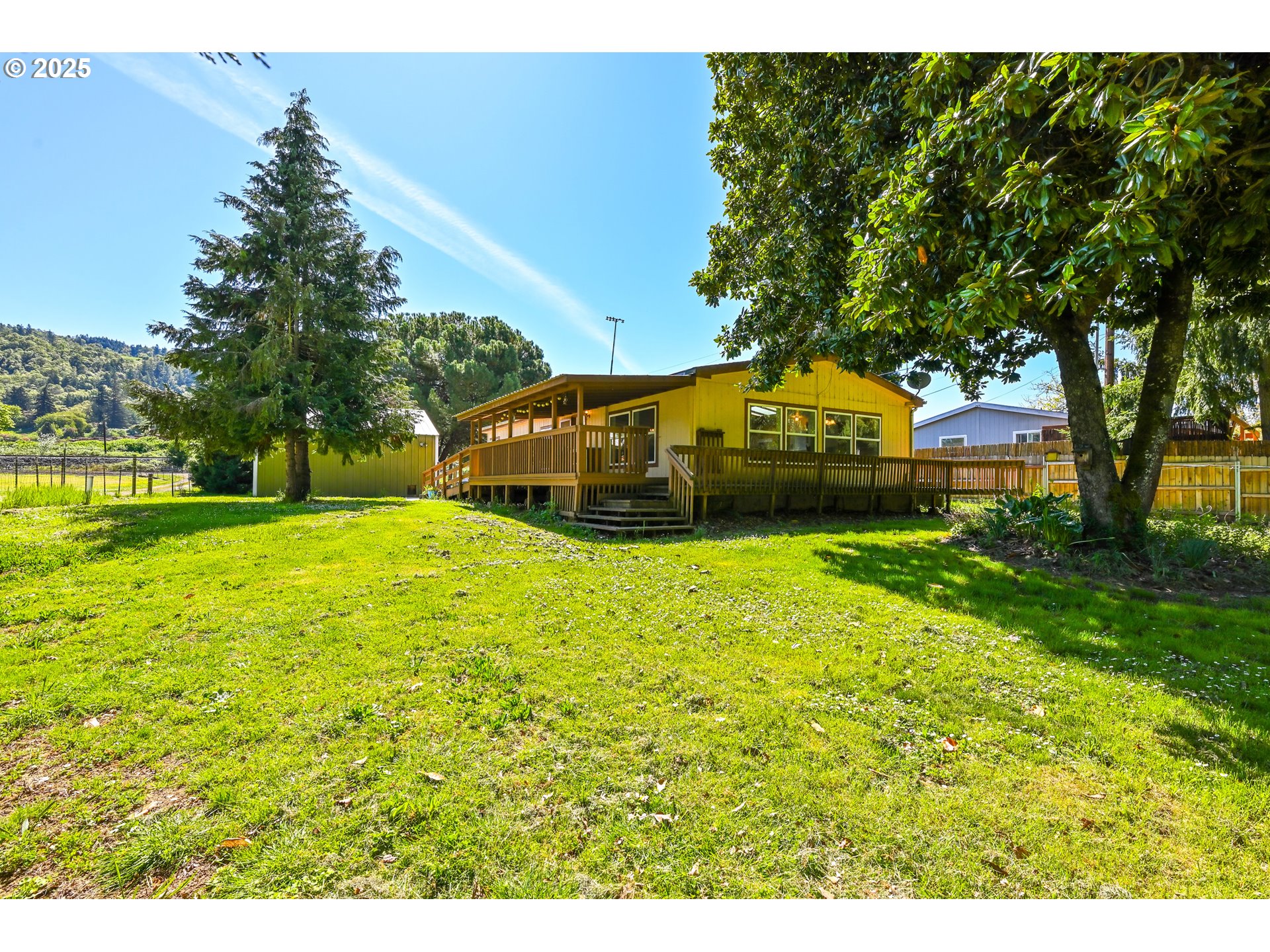 694 Tipton Road Roseburg, OR 97471 - Photo 7 of 36 a view of yard with swimming pool and green space