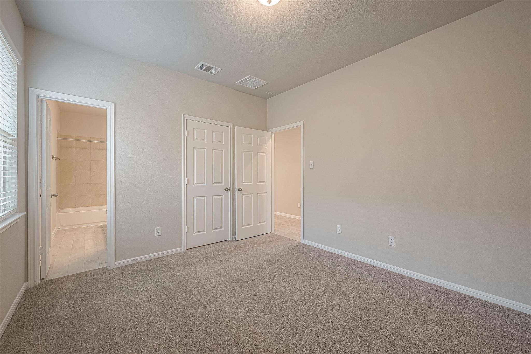 13314 Prado Rdg Lane Iowa Colony, TX 77583 - Photo 20 of 35 a view of an empty room