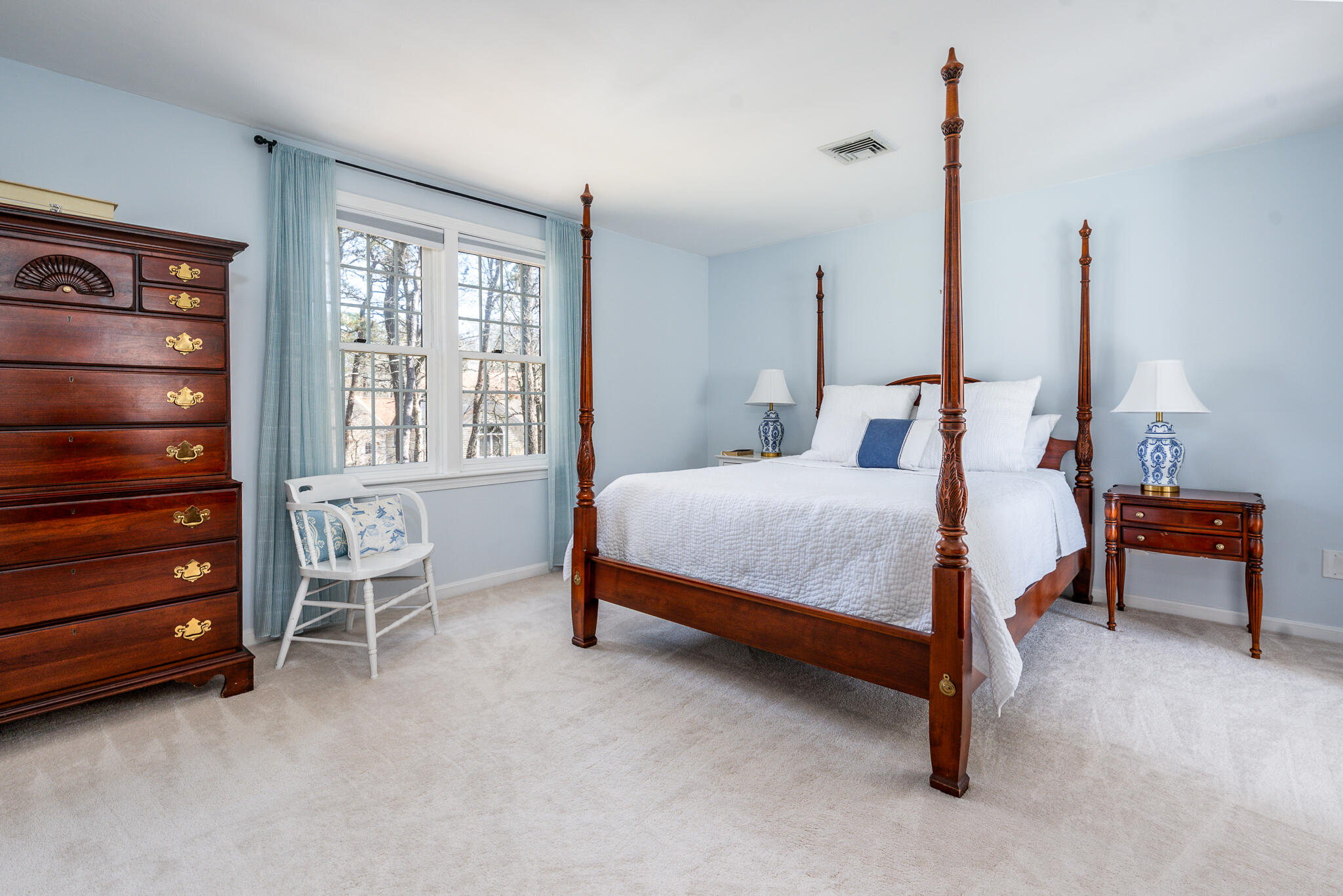 42 Eventide Lane Hyannis, MA 02601 - Photo 23 of 39 a bedroom with a bed a table and chair