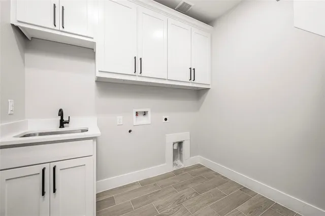 a view of cabinets with wooden floor