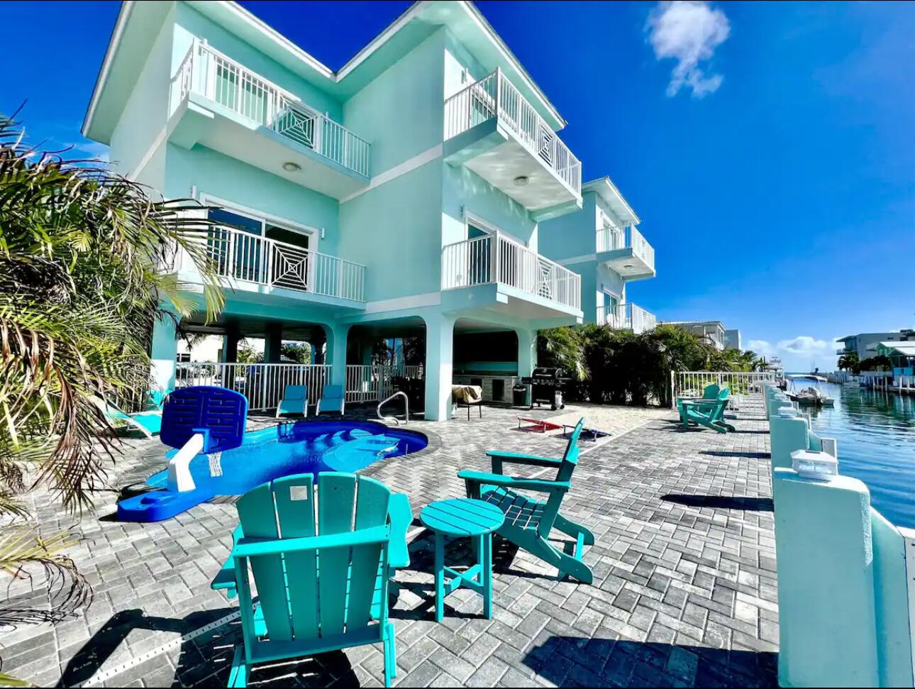 a view of a chairs and table in the patio