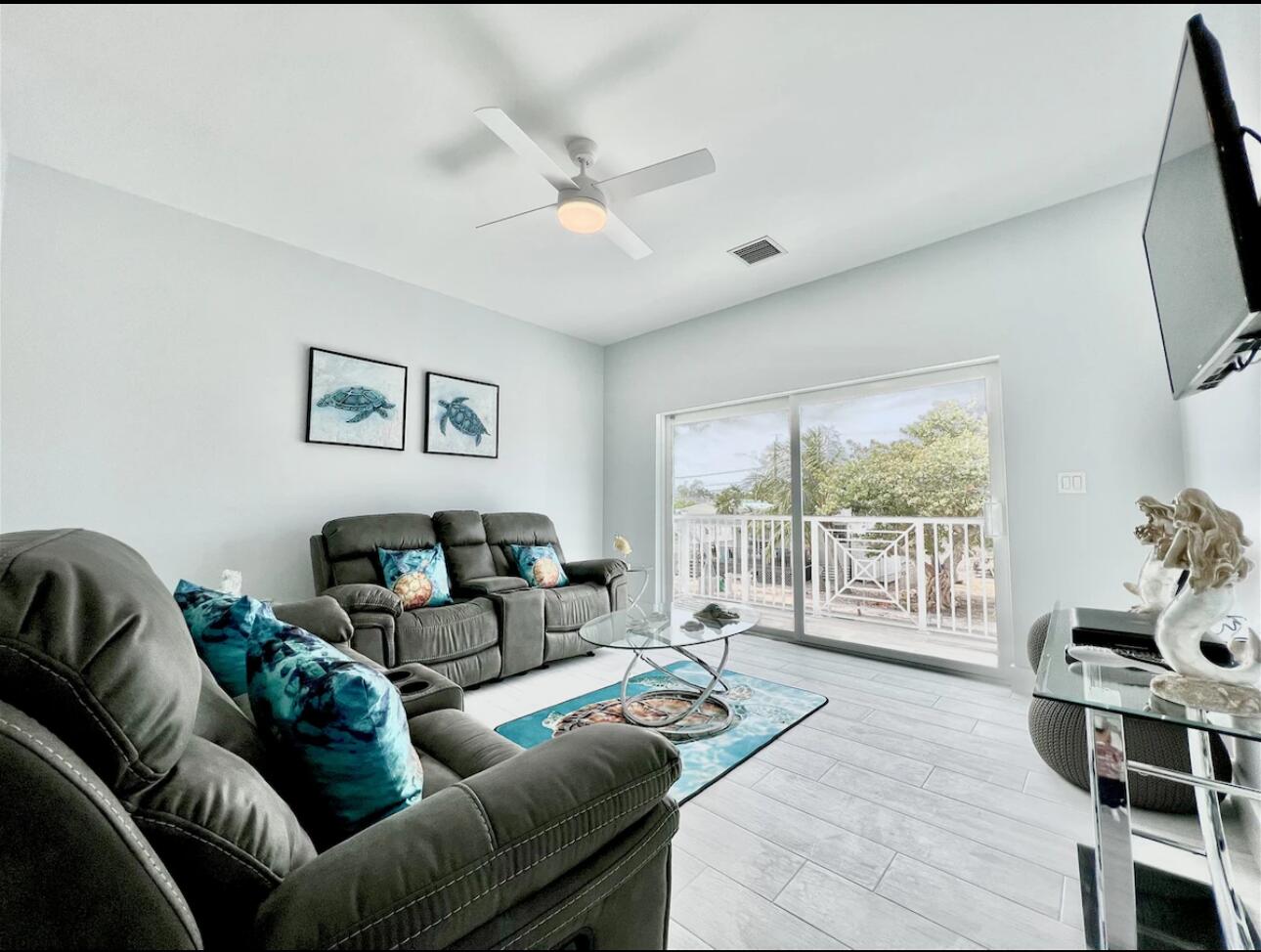 1021 82nd Street Marathon, FL 33050 - Photo 10 of 33 a living room with furniture and a large window